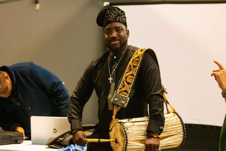 talking-drummer-at-sokoni-black-history-month-market_orig